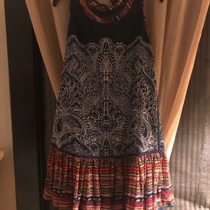 Size L, bohemian print. Tags on. Just above knee.